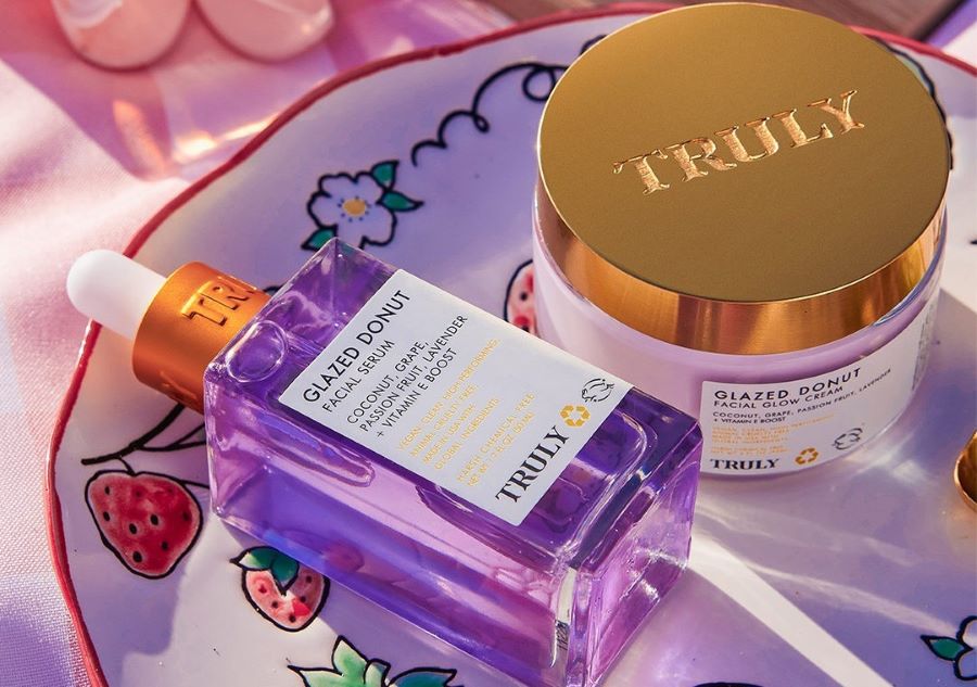 grapeseed oil for skin | Truly's glazed donut facial serum and face cream on plate