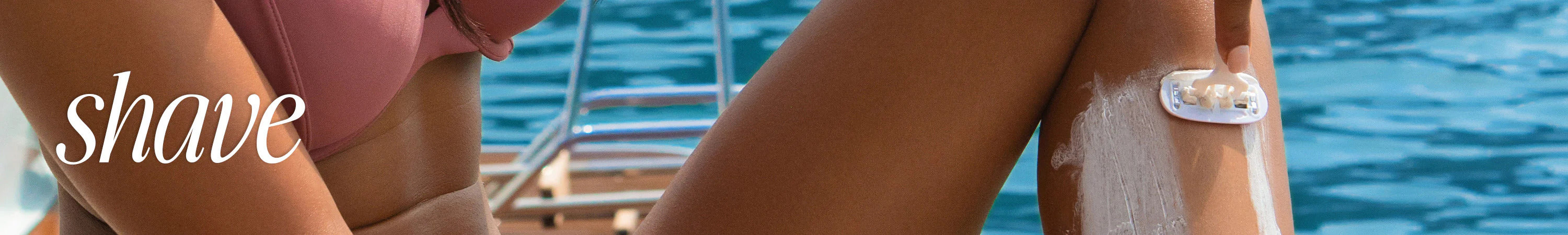 Banner with skincare bottles, a “Up to 50% off sitewide” label, “GET $200+ FREE MYSTERY PRODUCTS” promo, and a smiling woman by a pool holding sunscreen.