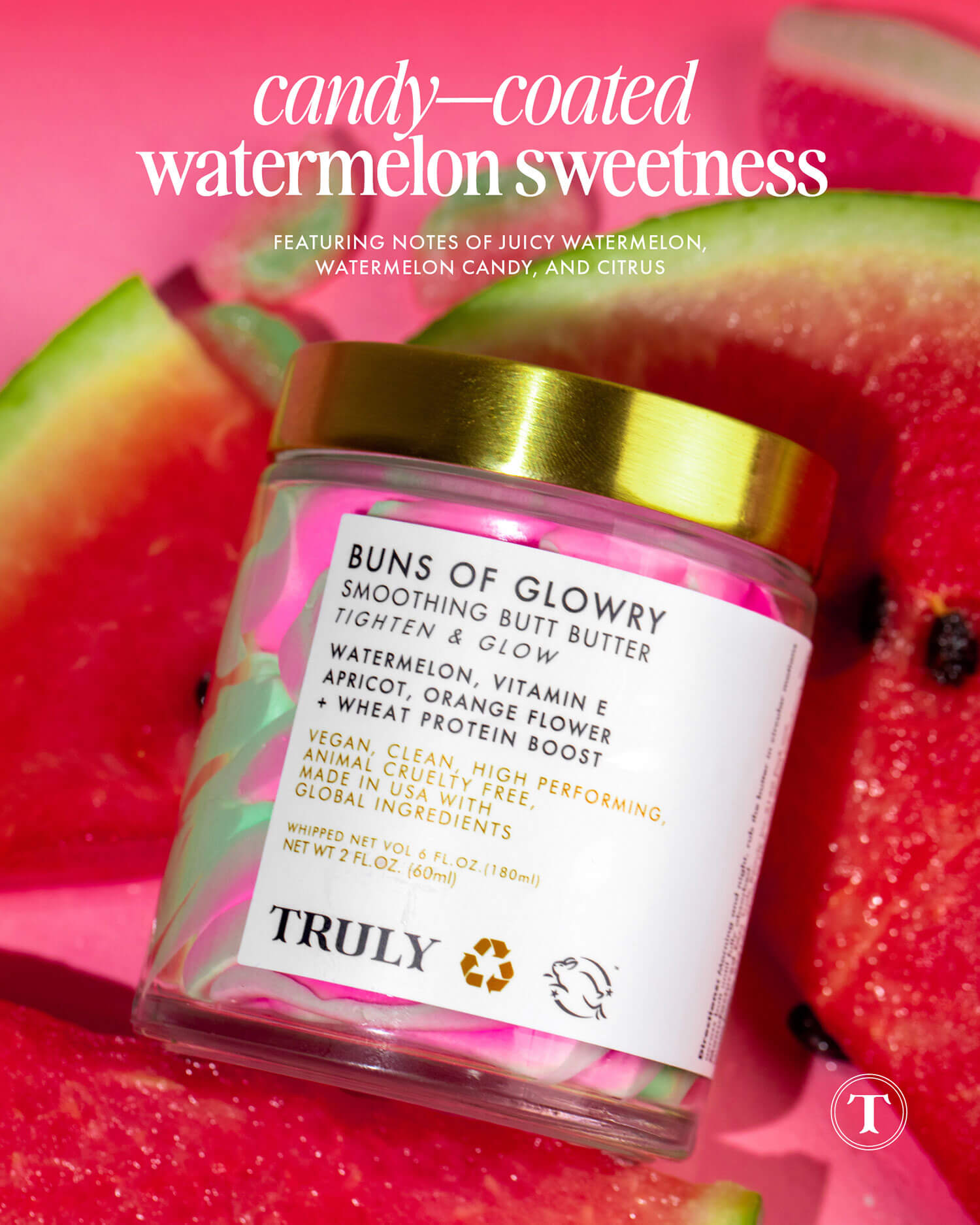 A jar of Buns of Glowry Butter by Truly Beauty sits on watermelon slices. The label highlights watermelon and vitamin E. Text above reads: “candy–coated watermelon sweetness.” Pair with Birthday Sex Luxury Body Oil for extra indulgence.