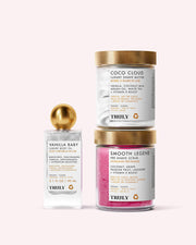 Truly Beauty’s Kaylas Everyday Routine set shines with gold lids against a soft pale pink background, adding a touch of everyday luxury.