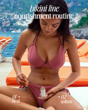 A woman in a mauve bikini sits poolside, applying Truly Beauty’s Cooka Oil to her bikini line. The text reads: Bikini Line Nourishment—Step 01 Heal, Step 02 Soften with Cooka Oil for soothing skin and preventing ingrown hair.