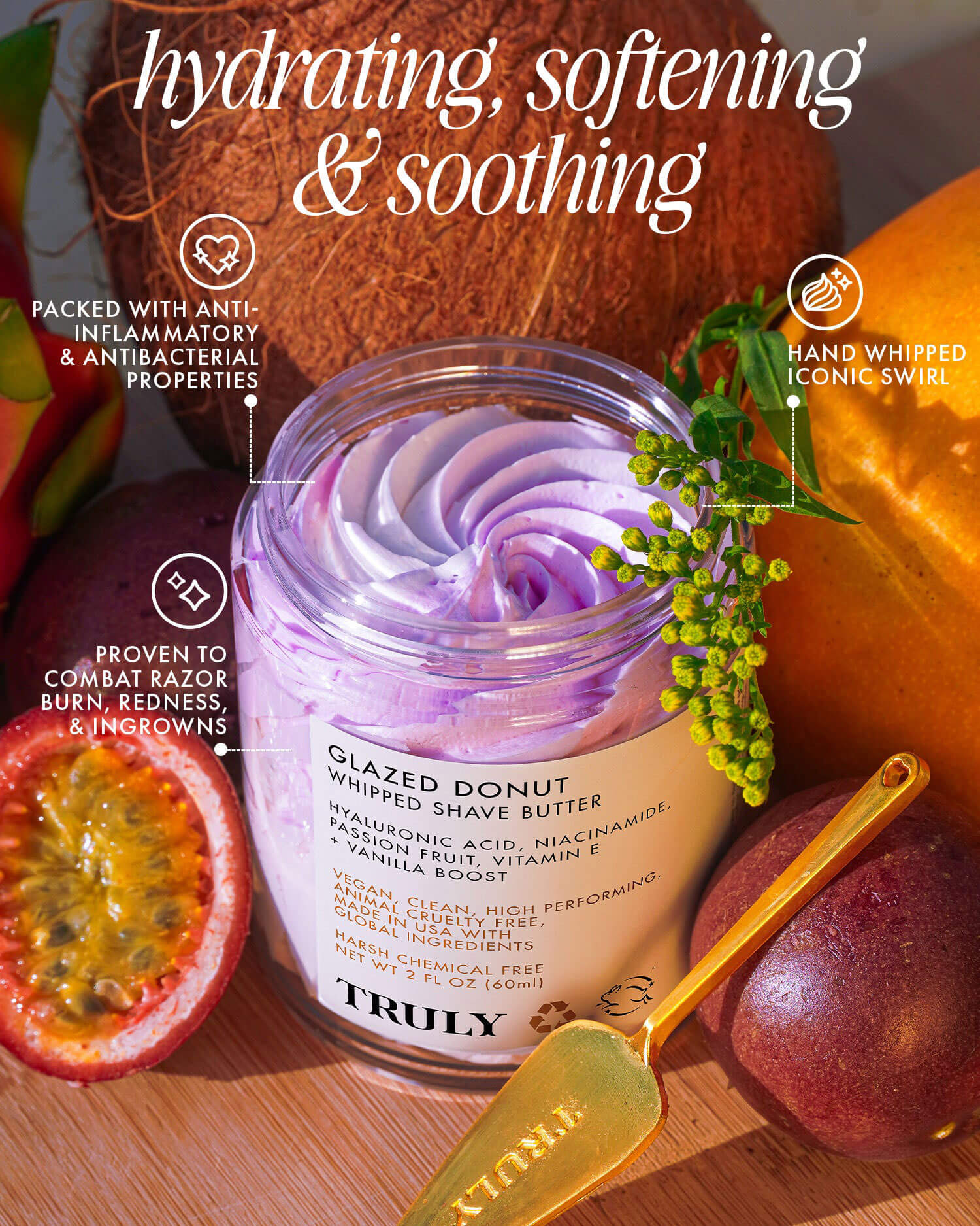 A Glazed Donut Shave Duo by Truly Beauty, featuring hydrating, softening, soothing, and razor burn relief benefits. The duo with a purple swirl jar is styled with a gold scoop, fruit, and flowers—perfect for Soft Serve Luxury Shave Butter fans.