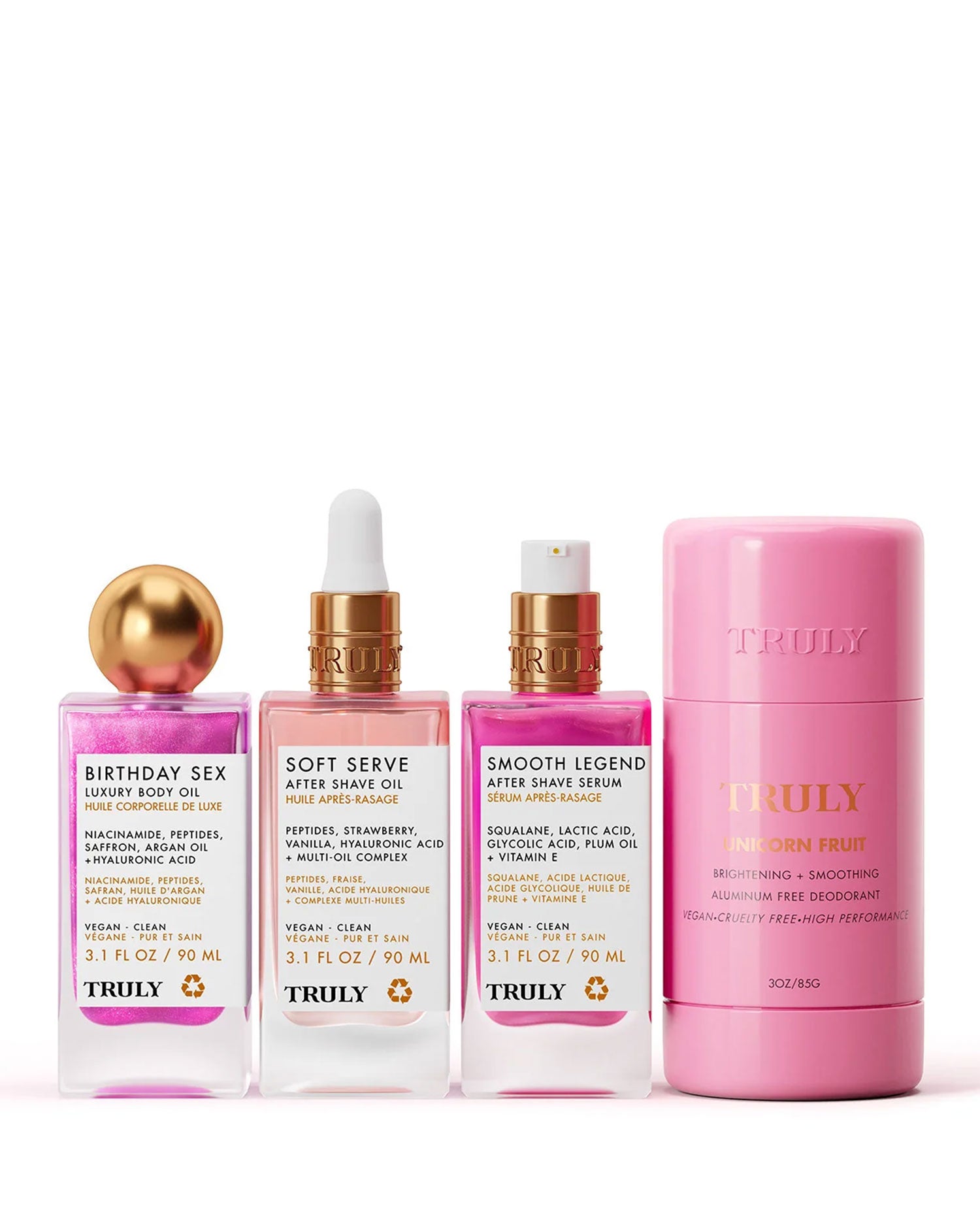 Four Truly Beauty Tiktok Pink Routine products are lined up on a light pink background, featuring three serum bottles with droppers and a round deodorant stick labeled Pineapple Fruit.