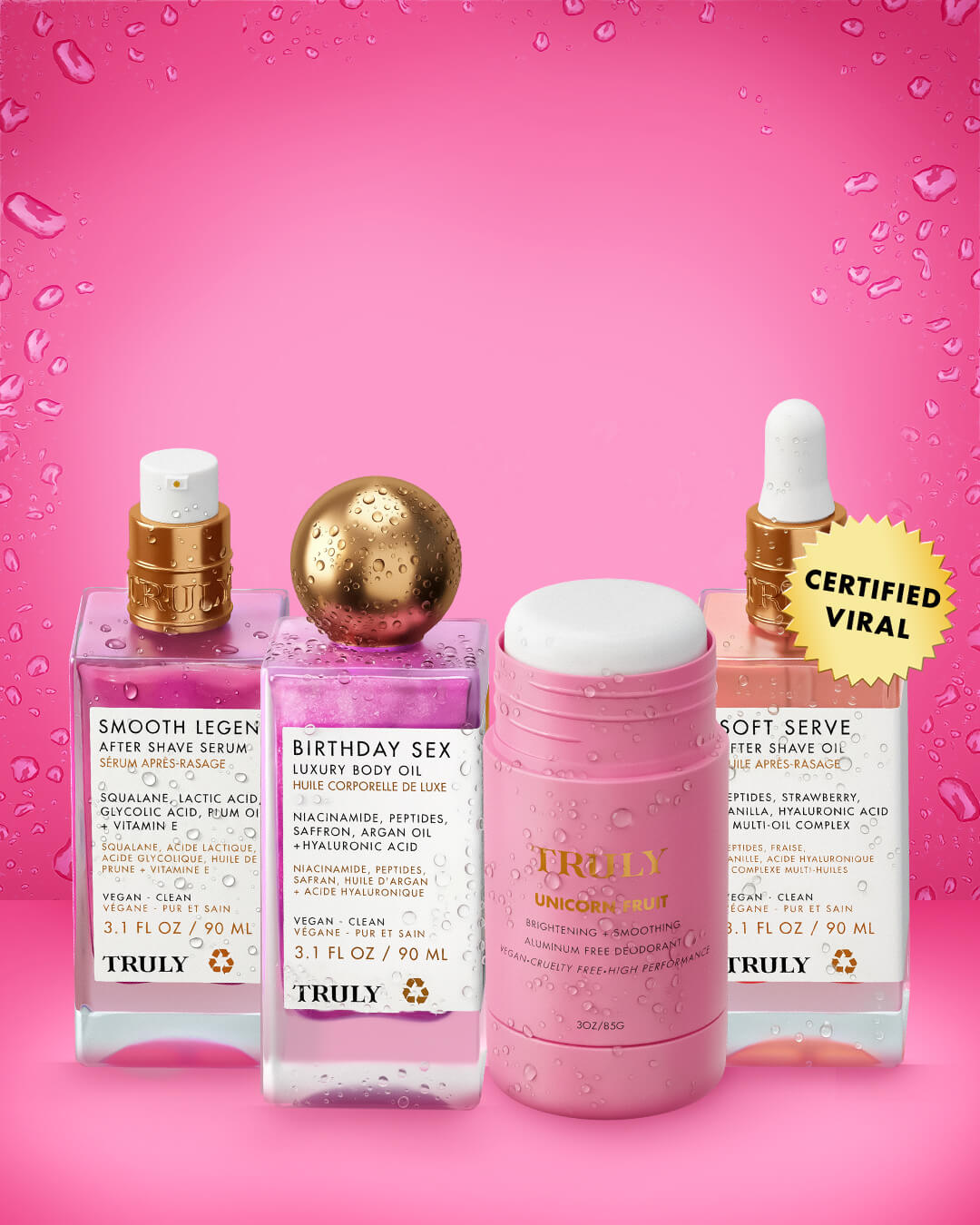Four Truly Beauty Tiktok Pink Routine products are lined up on a light pink background, featuring three serum bottles with droppers and a round deodorant stick labeled Pineapple Fruit.