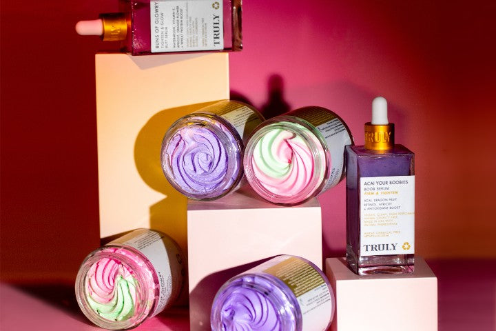 A selection of Truly Beauty products positioned on boxes