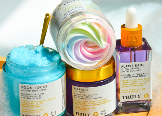 How Poor Nutrition Makes Your Skin Dry | young woman in kitchen pouring green smoothie into glass