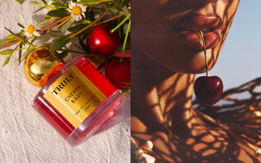 best gourmand fragrances 2026 | side by side images showing Truly's cherry baby perfume lying on table beside fresh cherries, right image shows closeup of dark cherry in woman's mouth 