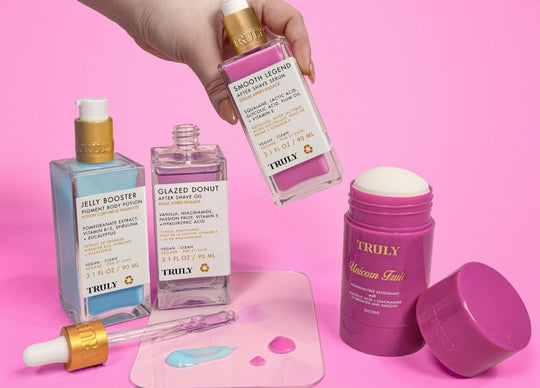 cold shower vs hot shower for skin | Back of woman in the shower washing hair | 