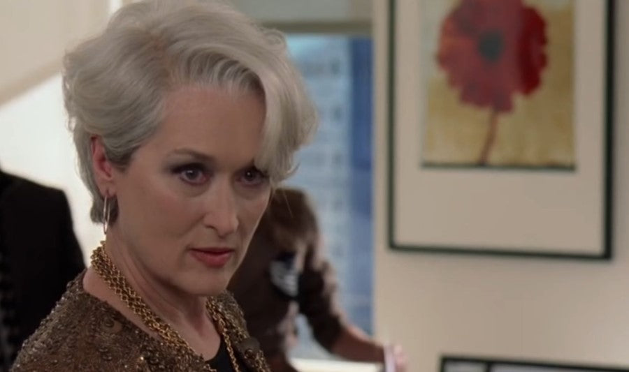 Meryl streep skincare routine | Movie still of Meryl Streep with short white hair in Devil's wear prada scene