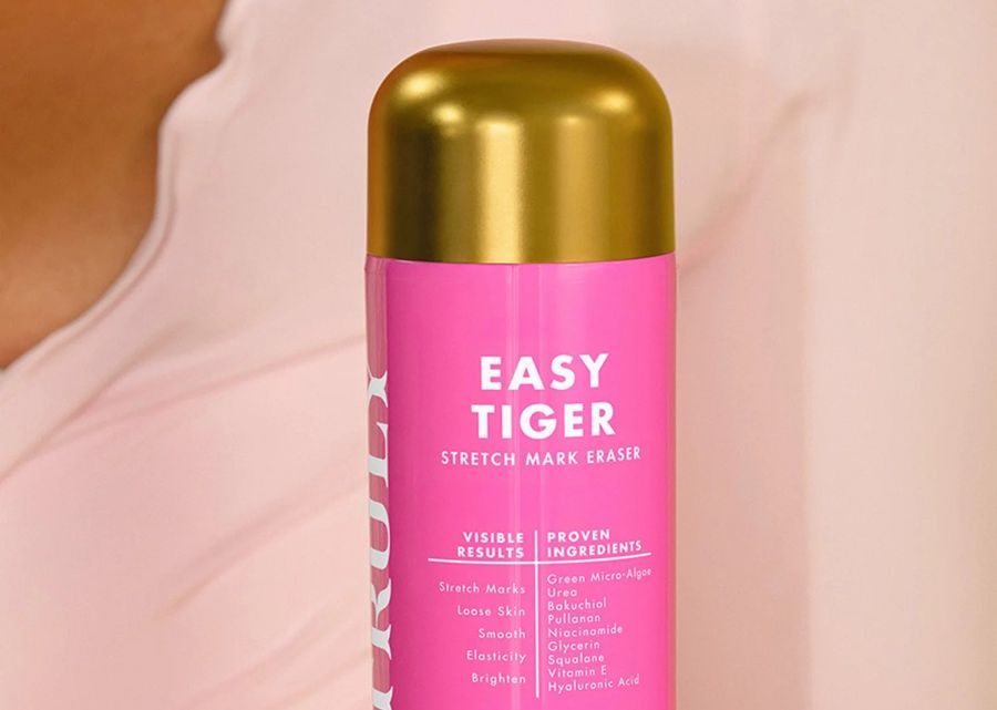 Pink bottle labeled 'Easy Tiger' with a blurred background | urea skin benefits