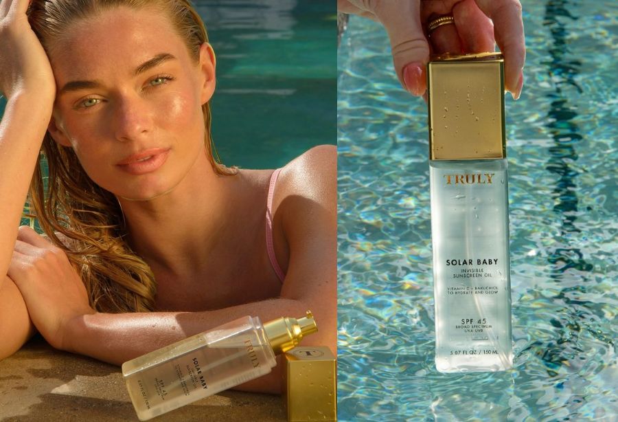 What is broad spectrum sunscreen | Side-by-side display features a woman with wet hair and sun-kissed skin at edge of pool and a close-up of a hand holding a bottle of Truly Solar Baby SPF 45 invisible sunscreen oil over shimmering turquoise water.