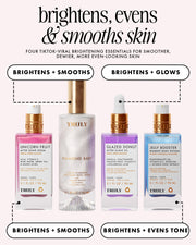 Four TRULY skincare bottles arranged on a light beige background with promotional text callouts: Unicorn Fruit after shave serum in pink, Diamond Bright after shave oil in frosted clear, Glazed Donut after shave oil in lavender, and Jelly Booster figure body potion in light blue. The headline reads 'brightens, evens & smooths skin'.