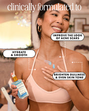 A smiling woman in a peach sports bra applies Truly Beauty’s Jelly Booster Pigment Body Potion to her chest. Text highlights its benefits: improves acne scars, hydrates and smooths skin, brightens dullness, and evens skin tone.