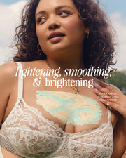 A woman outdoors wears a white lace bra and has a pastel mask on her chest. Text: Tighten, smooth & brighten chest with Truly Beauty’s Nice Melons Boob Polish—powered by kigelia, ginseng, and cantaloupe.