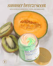 A halved cantaloupe, sliced kiwi, and a jar of Truly Beauty’s Nice Melons Boob Polish with swirled pastel colors sit on a white surface. Text reads: “Summer Breeze scent with notes of honeydew, citrus, and bergamot.”.