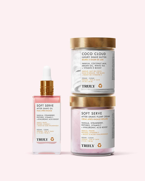 Three Truly Beauty Gabrielles Everyday Routine products on a light pink background: a glass dropper bottle and two jars for glowing, silky skin.