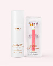 A white bottle of Truly Beauty Hydra-Smooth Shave Set cream next to a clear box containing a pink razor handle and two replacement cartridges.