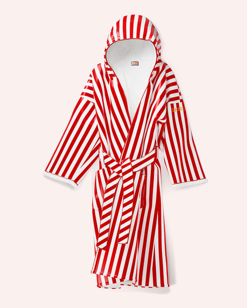 The Truly Beauty Signature VIP Collection Bath Robe features bold red and white diagonal stripes, a hood, matching belt, and long sleeves. Cozy and perfect for Valentine’s Day, its shown against a plain light background.