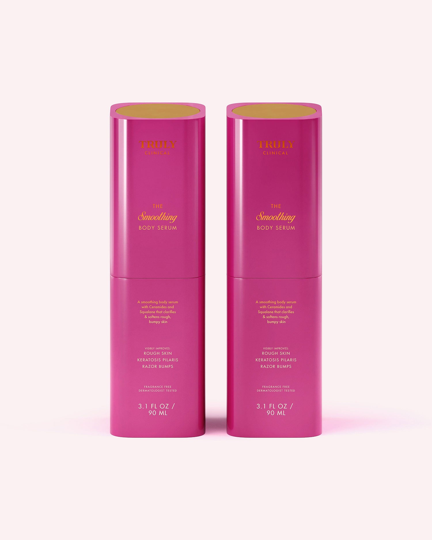 Two identical pink bottles of Truly Beauty's The Smoothing Body Serum (3.1 fl oz/90 ml each) for rough, bumpy skin or keratosis pilaris stand side by side on a light pink background with gold-printed product text and logo.