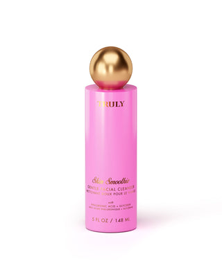 Pink bottle with gold cap on a white background