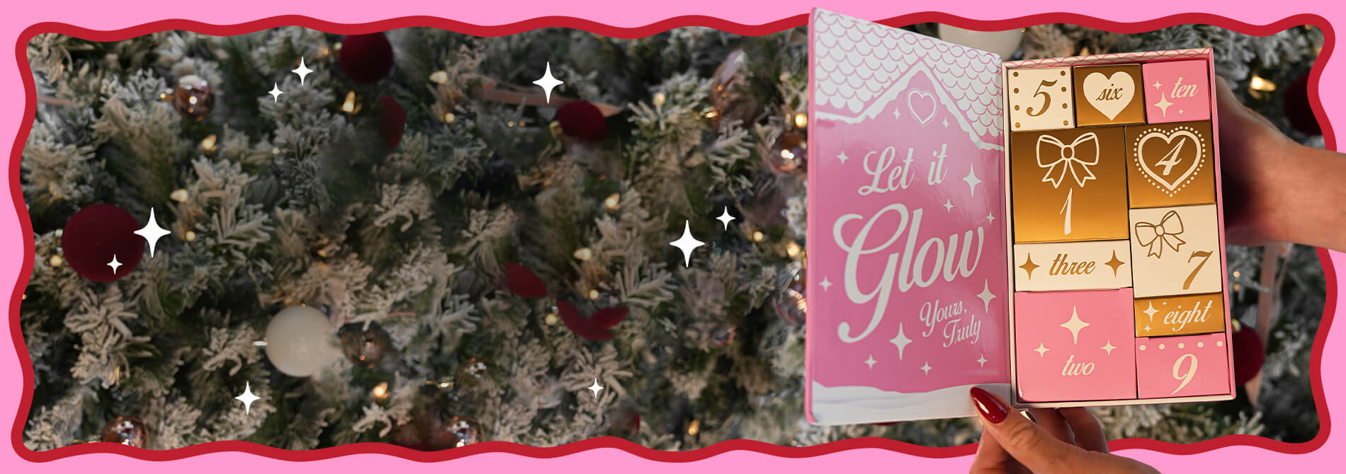 Decorative Christmas tree with a pink box of stickers featuring heart designs for 2025 Beauty Advent Calendar