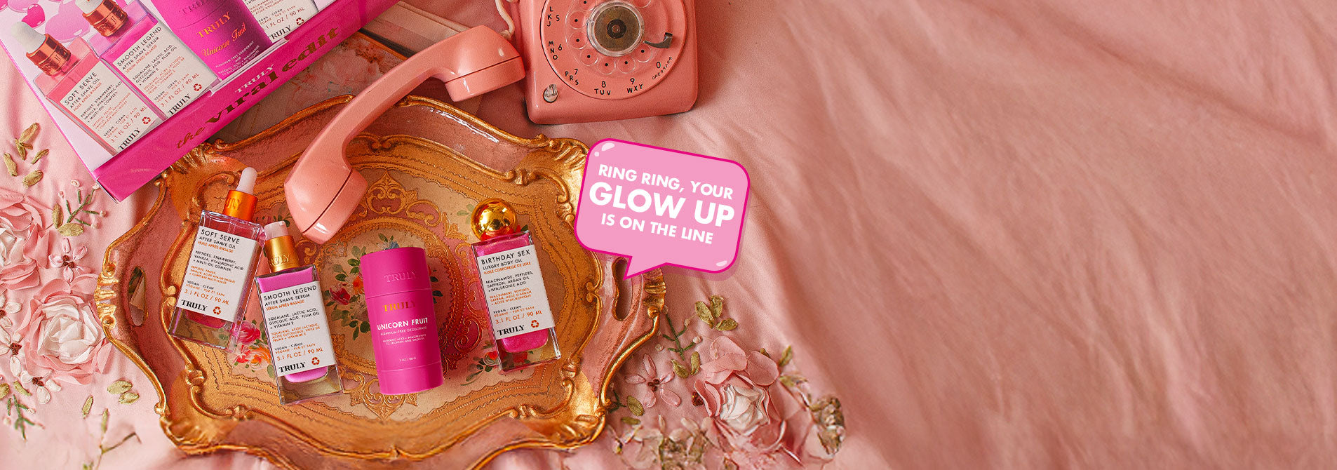 The viral kit Cosmetic products on a decorative tray with a pink background